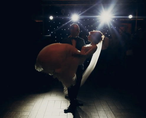 gorgeous wedding couple performing first dance