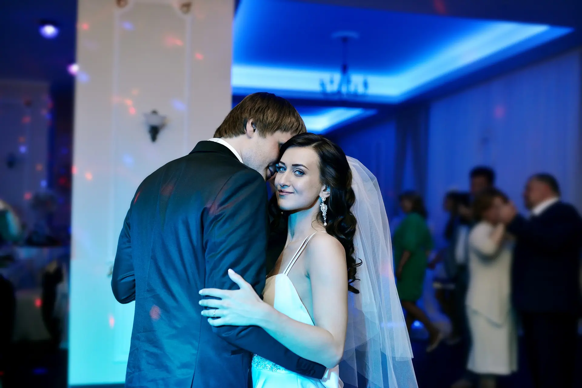 bride and groom dancing